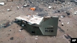 FILE - This undated photo released by the Ukrainian military's Strategic Communications Directorate shows what Kyiv described as an Iranian Shahed drone downed near Kupiansk, Ukraine. The U.S. has expressed alarm over a "full-scale defense partnership" between Russia and Iran.