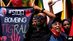 FILE - Members of the Tigrayan community protest against the conflict between Ethiopia and Tigray rebels in Ethiopia's Tigray region, outside the the United Arab Emirates embassy in Pretoria, South Africa, Oct. 12, 2022. 