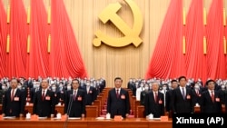 Chinese Communist Party leaders, including Zhao Leji,, Wang Yang, Premier Li Keqiang, President Xi Jinping, and others attend the opening ceremony of the National Congress of the Communist Party of China at the Great Hall of the People in Bejing, Oct. 16, 2022.