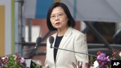 FILE - Taiwanese President Tsai Ing-wen in front of the Presidential Building in Taipei, Taiwan, Oct. 10, 2022. 