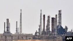 FILE - This file photo taken on Sept. 15, 2019, shows an Aramco oil facility near al-Khurj area, just south of the Saudi capital, Riyadh.