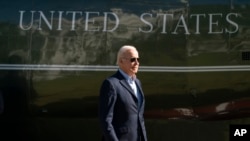 FILE - President Joe Biden walks to the Oval Office after arriving on Marine One on the South Lawn of the White House, in Washington, Oct. 10, 2022. 