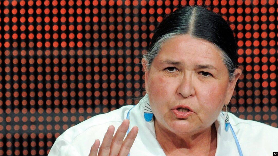 FILE - Activist and actress Sacheen Littlefeather takes part in a panel discussion on the PBS special 'Reel Injun' at the PBS Television Critics Association summer press tour in Beverly Hills, Calif., Aug. 5, 2010.