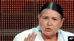 FILE - Activist and actress Sacheen Littlefeather takes part in a panel discussion on the PBS special 'Reel Injun' at the PBS Television Critics Association summer press tour in Beverly Hills, Calif., Aug. 5, 2010.