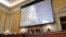 FILE - A video of Steve Bannon speaking is shown as the House select committee investigating the January 6 attack on the U.S. Capitol holds a hearing, on Capitol Hill in Washington, Oct. 13, 2022.