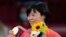 Shori Hamada of Japan celebrates with her gold medal during the awarding ceremony of the women's -78kg judo match of the 2020 Summer Olympics in Tokyo, Japan, July 29, 2021. 