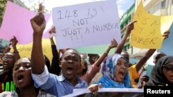University students join a demonstration condemning the gunmen attack at the Garissa University campus, in the Kenyan coastal port city of Mombasa, April 8, 2015.