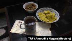 Tea and snacks are seen at the home of a resident of Kavaratti island, the capital of India's Lakshadweep islands, May 6, 2018. 