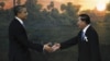 U.S. President Barack Obama, left, is greeted by Cambodia's Prime Minister Hun Sen before the ASEAN-U.S. leaders meeting in Phnom Penh, Cambodia, Monday, Nov. 19, 2012. (AP Photo/Vincent Thian)