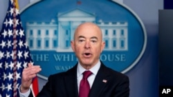 FILE - In this Monday, March 1, 2021 file photo, Homeland Security Secretary Alejandro Mayorkas speaks during a press briefing at the White House in Washington. The Biden administration is turning to the Federal Emergency Management Agency for help…