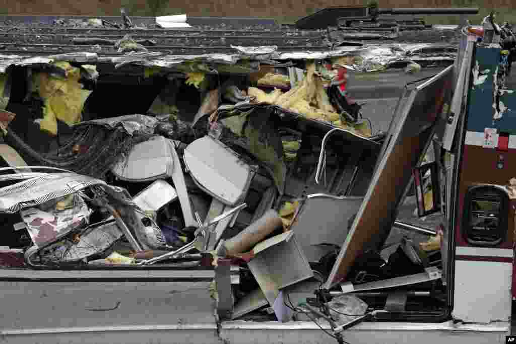 Seats are pushed together with other debris on an upside-down Amtrak train, following Monday&#39;s deadly crash onto Interstate 5 in the American state of Washington.&nbsp;