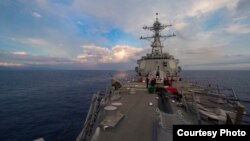 The Arleigh Burke-class guided-missile destroyer USS Dewey (DDG 105) transits the South China Sea. (U.S. Navy Photo By Mass Communication Specialist 3rd Class Kryzentia Weiermann/released 5/6/2017)