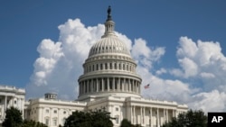 The U.S. Capitol is seen in Washington, Sept. 3, 2018. Twitter CEO Jack Dorsey and Facebook COO Sheryl Sandberg will answer questions about cybersecurity before the Senate Intelligence Committee on Wednesday.