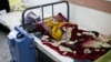 FILE — A 10-year-old Palestinian boy, Yazan al-Kafarna, who was born with cerebral palsy, lies at a hospital in Rafah, Gaza Strip, March 3, 2024. Yazan died due to what his doctor said was extreme muscle wastage caused primarily by a lack of food.