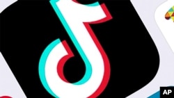 FILE - This Feb. 25, 2020, file photo, shows the icon for TikTok in New York. Amazon has told employees to delete the popular video app TikTok from phones on which they use Amazon email.