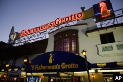 FILE - A restaurant is pictured along Fisherman's Wharf in San Francisco, Nov. 10, 2015. Pier 39, reportedly the planned target of a terrorist attack by a man arrested this week, is at the edge of the Fisherman's Wharf district.