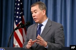 FILE - Under Secretary of Defense for Policy John Rood, speaks during a news conference on the 2018 Nuclear Posture Review, at the Pentagon, Feb. 2, 2018.