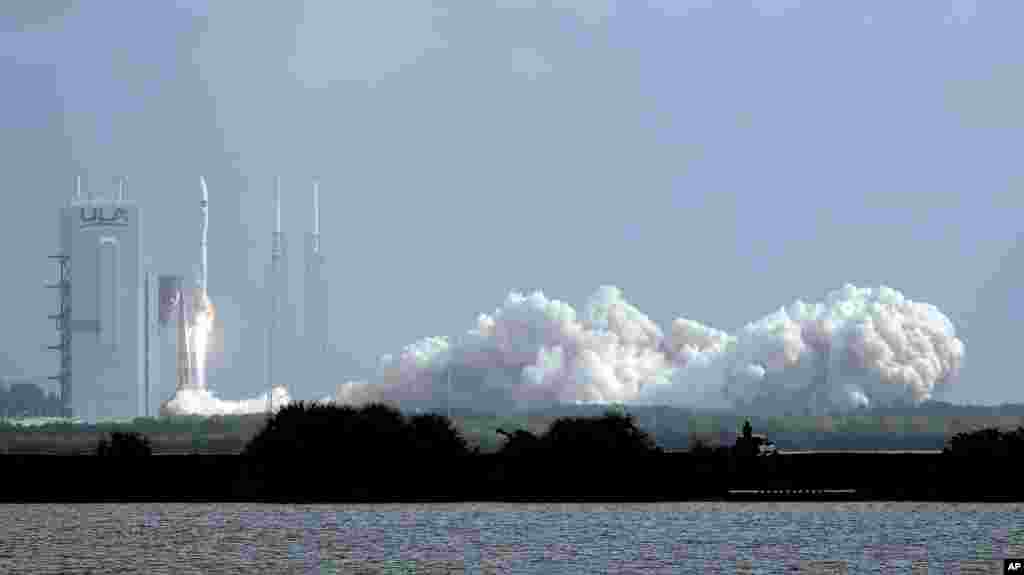 A United Launch Alliance Atlas V rocket lifts off from Launch Complex 41 at the Cape Canaveral Air Force Station, in Cape Canaveral, Florida. The mission's primary payload is the X-37B spaceplane. 