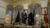 FILE - Turkish President Recep Tayyip Erdogan, right, and Qatar's Emir Sheik Tamim bin Hamad Al Thani shake hands as they pose for a photo at the Mabeyn Palace, one of old Ottoman palaces in Istanbul, Friday, Feb. 12, 2016.