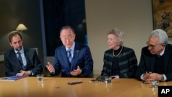 Zeid Ra'ad Al Hussein, left, Mary Robinson, second-right, and Ernesto Zedillo, right, listen as former U.N. Secretary-General Ban Ki-moon speaks during an interview with The Associated Press, in New York, Nov. 4, 2022. The former officials are part of a group known as The Elders.