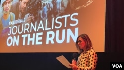 Acting VOA Director Yolanda López speaks at a Missouri School of Journalism screening of a VOA documentary in Columbia, Missouri.