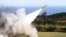 FILE - A HAWK surface-to-air missile is test-fired from Jeoupeng military base in Taiwan, Jan. 18, 2011. Refurbished missiles, T-72B tanks and other weaponry are part of the $400 million in security assistance headed for Ukraine, U.S. officials announced 