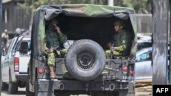 Ecuadorian soldiers enter the Litoral Penitentiary in Guayaquil, Ecuador, on Nov. 4, 2022.