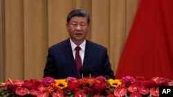 Chinese President Xi Jinping delivers his speech at a dinner marking the 75th anniversary of the founding of the People's Republic of China, at the Great Hall of the People in Beijing, Sept. 30, 2024. 