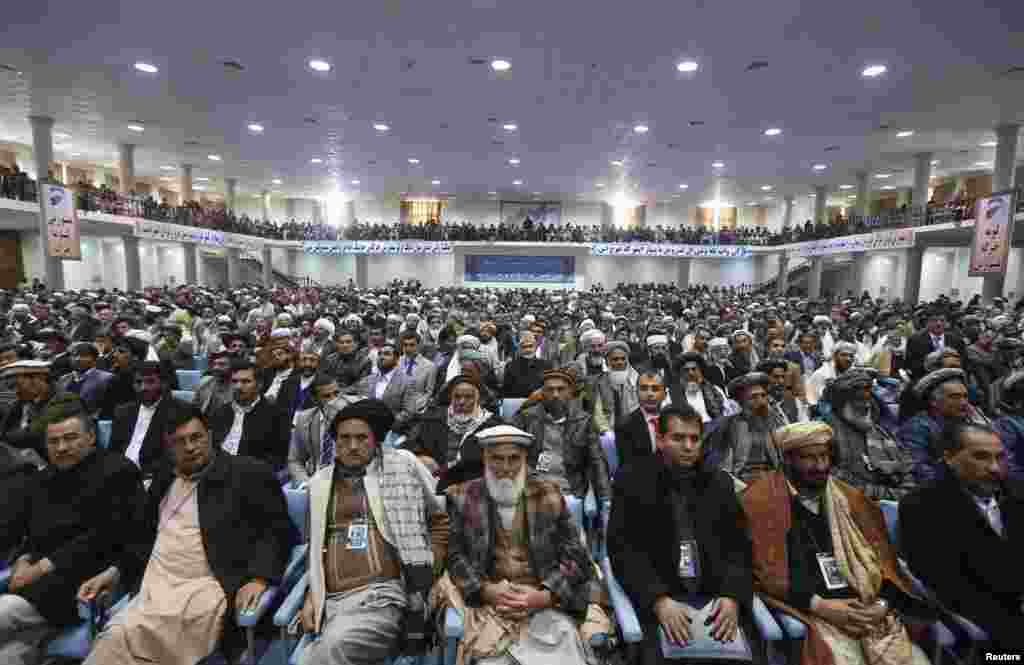 Members of the Afghan Loya Jirga attend a gathering in Kabul, Nov. 21, 2013. 