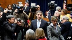 Michael Cohen, President Donald Trump's former personal lawyer, arrives to testify before the House Oversight and Reform Committee on Capitol Hill, Feb. 27, 2019, in Washington.