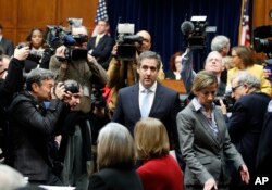 Michael Cohen, President Donald Trump's former personal lawyer, arrives to testify before the House Oversight and Reform Committee on Capitol Hill, Feb. 27, 2019, in Washington.