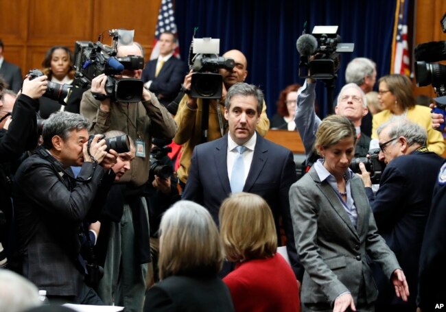 Michael Cohen, President Donald Trump's former personal lawyer, arrives to testify before the House Oversight and Reform Committee on Capitol Hill, Feb. 27, 2019, in Washington.