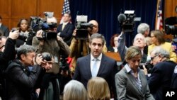 Michael Cohen, President Donald Trump's former personal lawyer, arrives to testify before the House Oversight and Reform Committee on Capitol Hill, Feb. 27, 2019, in Washington.