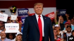 President Donald Trump arrives to speak at a rally at Aaron Bessant Amphitheater, May 8, 2019, in Panama City Beach, Fla.