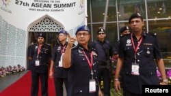 Police officers check security arrangements for the 27th Association of Southeast Asian Nations (ASEAN) summit in Kuala Lumpur, Malaysia, Nov. 20, 2015. 