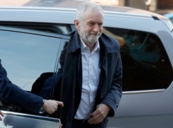 FILE - Britain's Labour Party leader Jeremy Corbyn arrives for a general election campaign in London, Britain, Oct. 31, 2019.