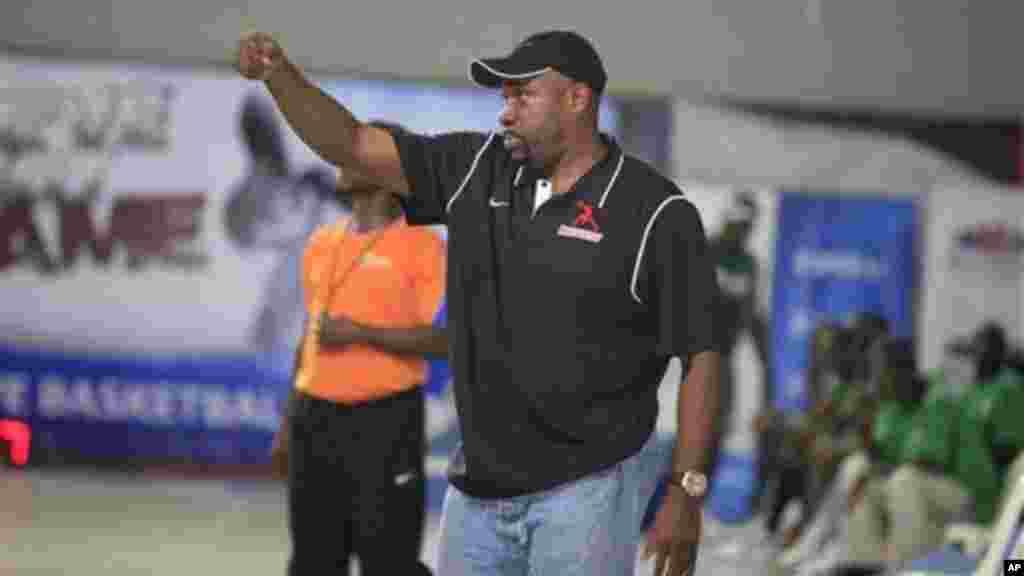 Joe Touomou, head coach Mark Mentors and a consultant to the Nigeria Basketball Federation, give instructions during a basketball match between Mark Mentors against Kano Pillars in Lagos, Nigeria.