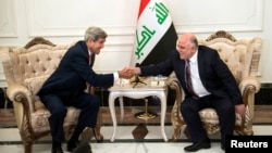 10일 존 케리 미 국무장관(왼쪽)이 이라크 바그다드에서 하이데르 알 아바디 이라크 신임 총리와 회동했다.