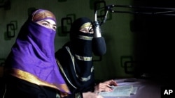 FILE - Broadcasters of Radio Shaesta prepare to go on air, in Kunduz, Afghanistan, March 4, 2016. Reporters Without Borders says that about 600 of the 2,700 female reporters active before the Taliban took control in August 2021 are still working in the country. 