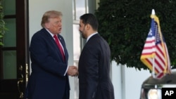 علی الزیدی، صدر اعظم عراق (راست) و دونالد ترمپ، رییس جمهور ایالات متحده امریکا