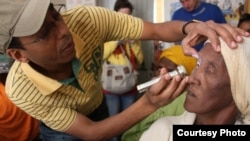 Dr. Amir Bedri examining a trachoma patient