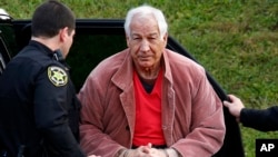 Former Penn State University assistant football coach Jerry Sandusky arrives for an appeal hearing at the Centre County Courthouse in Bellefonte, Pennsylvania, Oct. 29, 2015. Penn State was fined $2.4 million for failing to warn students and employee