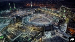 Muslim pilgrims pray at the Grand Mosque, ahead of the annual Hajj pilgrimage in the Muslim holy city of Mecca, Saudi Arabia, Aug. 16, 2018.