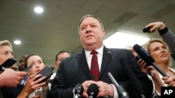  Secretary of State Mike Pompeo speaks to members of the media after a closed door meeting with Senators about Saudi Arabia at the Capitol in Washington, Nov. 28, 2018. 