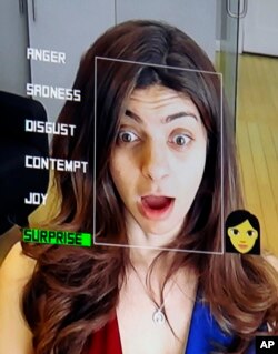 Rana el Kaliouby, CEO of the Boston-based artificial intelligence firm Affectiva, demonstrates the company's facial recognition technology, in Boston, April 23, 2018.