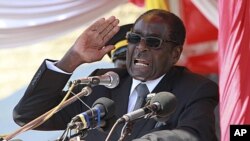 Zimbabwean President Robert Mugabe addresses supporters in Harare, July 20, 2011