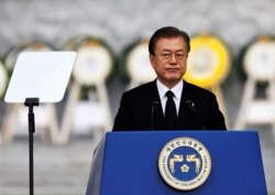 South Korean President Moon Jae-in delivers his speech during a ceremony marking Korean Memorial Day at the National Cemetery in Seoul, South Korea, June 6, 2019.