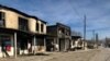 A view shows buildings burned during a series of clashes in Masanchi village in Zhambyl province, Kazakhstan, Feb. 8, 2020. 