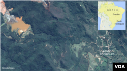 Bendungan berisi lumpur dan limbah tambang (kiri atas) pecah dan membanjiri kota Bento Rodriquez di Brazil (foto: Google Map).