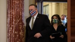 Menteri Luar Negeri AS Mike Pompeo mengenakan masker saat tiba untuk mengadakan konferensi pers dengan Menteri Luar Negeri Inggris Dominic Raab di Washington, DC, pada 16 September 2020. (Foto: AFP/Nicholas Kamm)